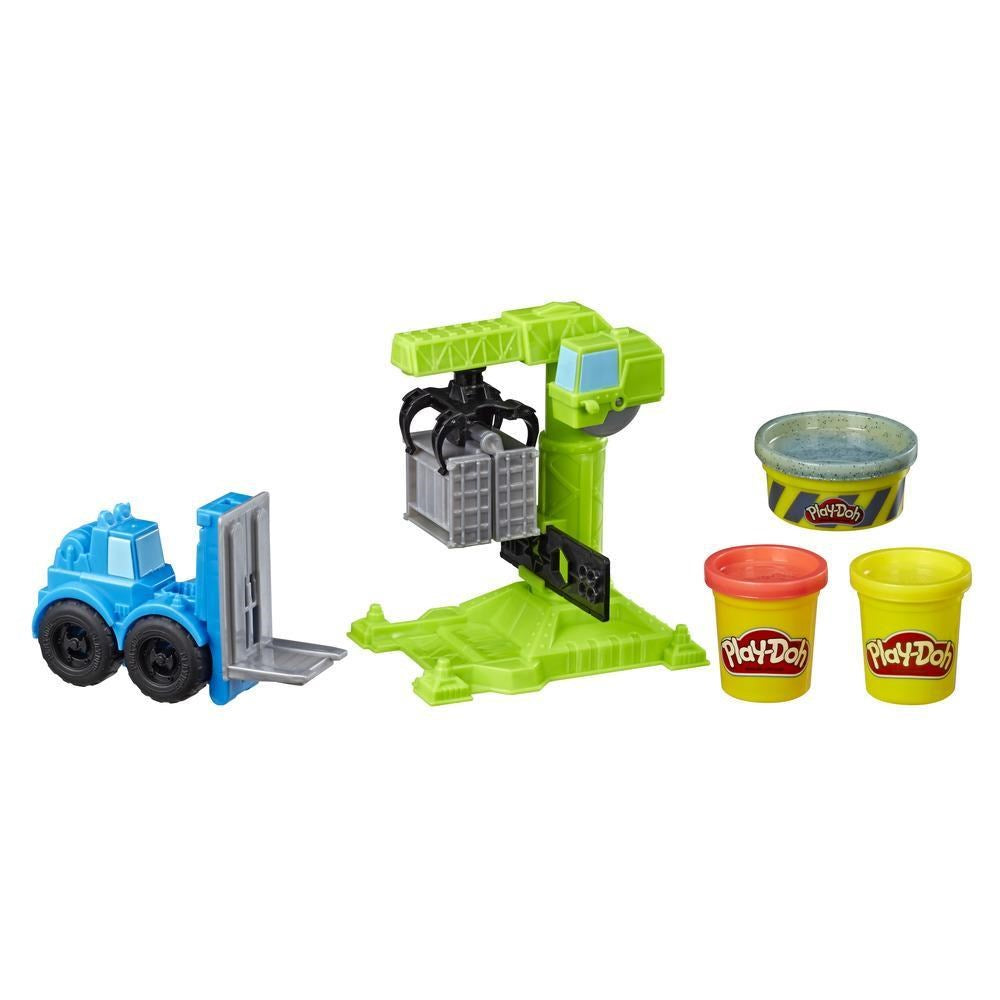 Blue toy forklift with gray forks, green toy crane with a black basket, and three Play-Doh containers in yellow, red, and.