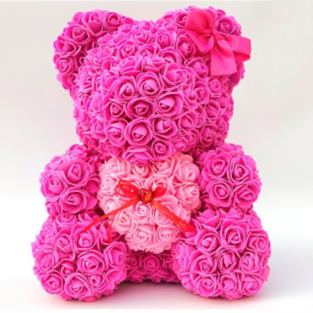15-inch teddy bear made of bright fuchsia foam roses holding a light pink rose heart with a red bow, adorned with a matching