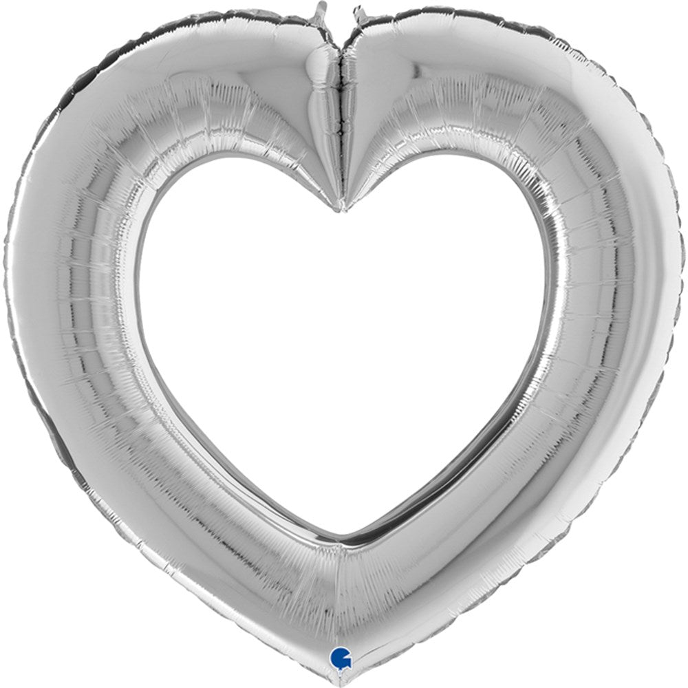 Silver foil balloon shaped like a hollow heart with a metallic finish and reflective surface.