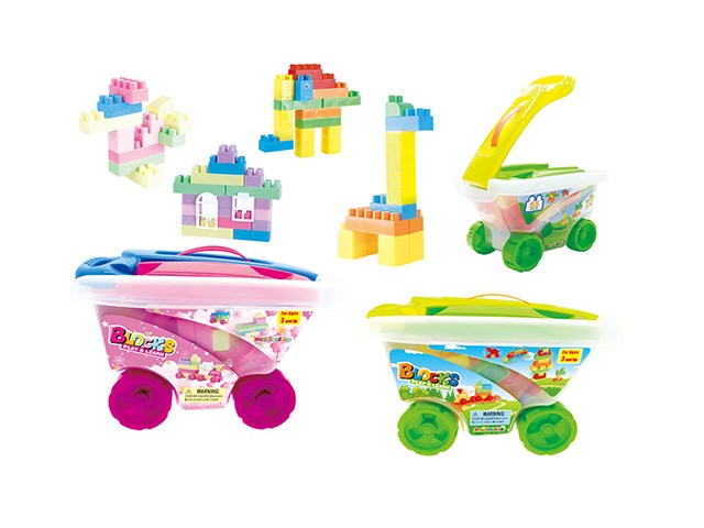 Colorful plastic blocks play set with two tow truck-style storage containers, pink and green wheels, yellow towing arm on.