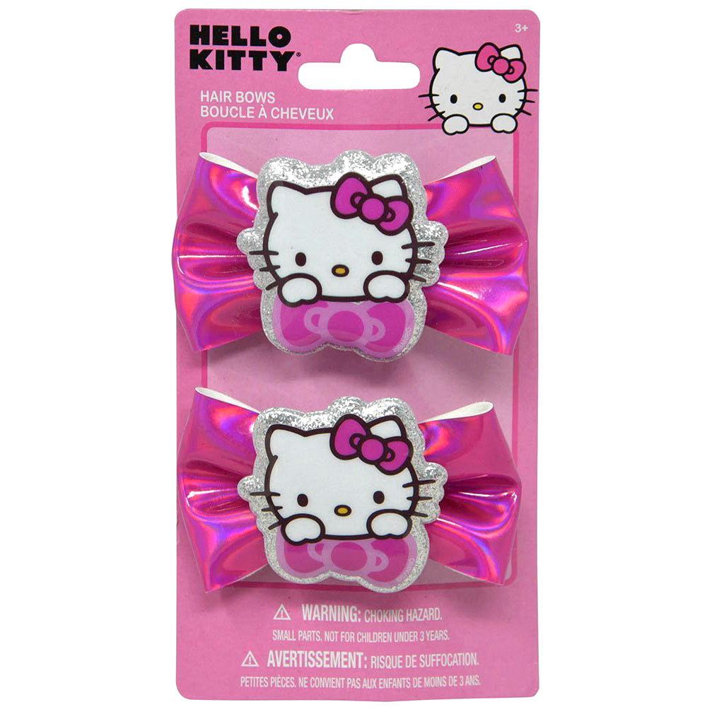 Set of two metallic pink hair bows each featuring a white Hello Kitty face with a pink bow on a pink backing card.
