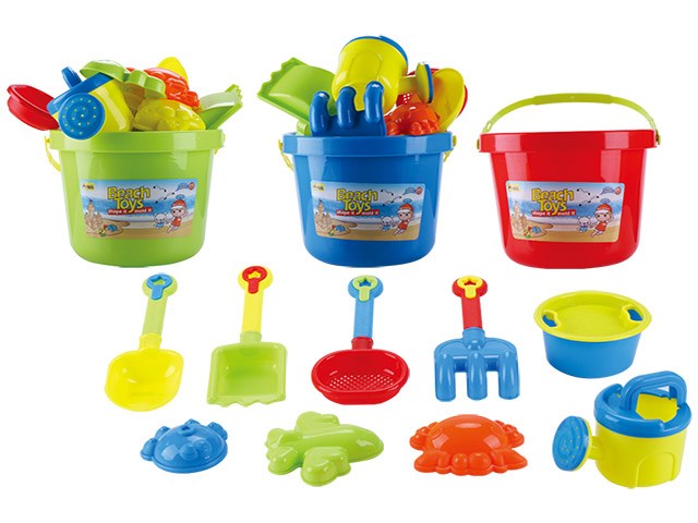 Colorful plastic sand play set with buckets, shovels, rakes, molds, and a watering can.
