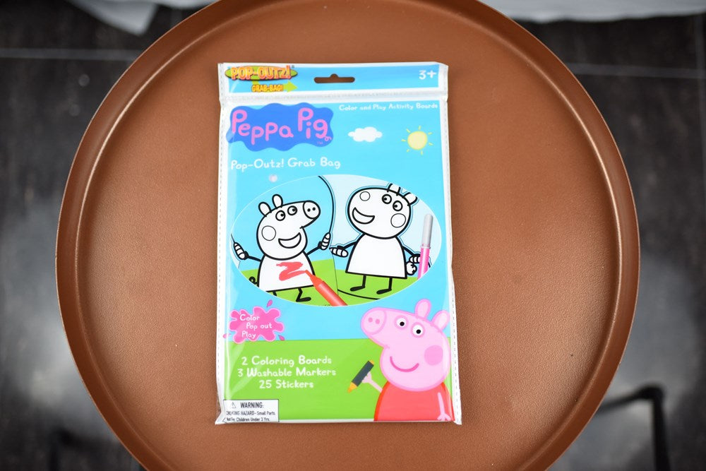 Peppa Pig Take N Play bag with cartoon characters on blue and green background.
