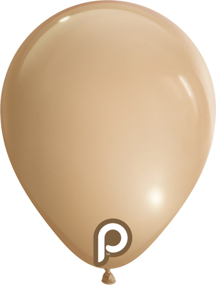 Blush-colored latex balloon inflated, smooth surface, classic round shape, glossy finish.