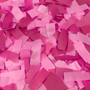 Loose pink rectangular paper confetti pieces in various shades and sizes.