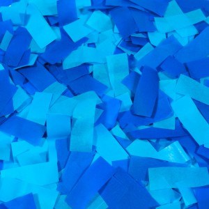Blue paper confetti pieces scattered densely with various rectangular shapes and shades of blue.