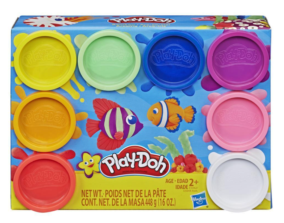 Eight colorful Play-Doh containers arranged in two rows on a colorful ocean-themed box with fish and bubbles graphics.