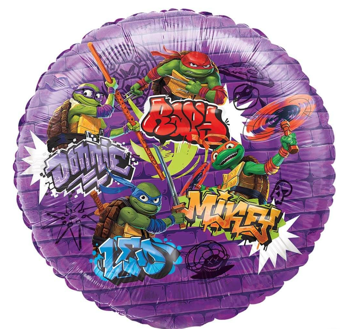 Purple round foil balloon featuring Teenage Mutant Ninja Turtles Raphael, Donatello, Leonardo, and Michelangelo with.