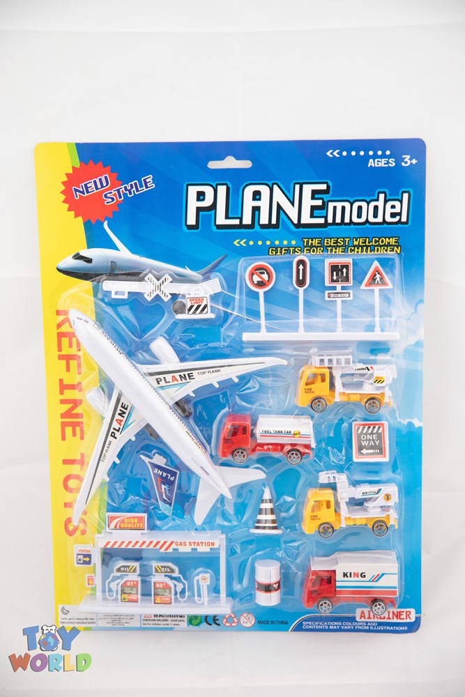 White toy airplane and small red and yellow cars with miniature road signs in clear blister packaging on blue backing.