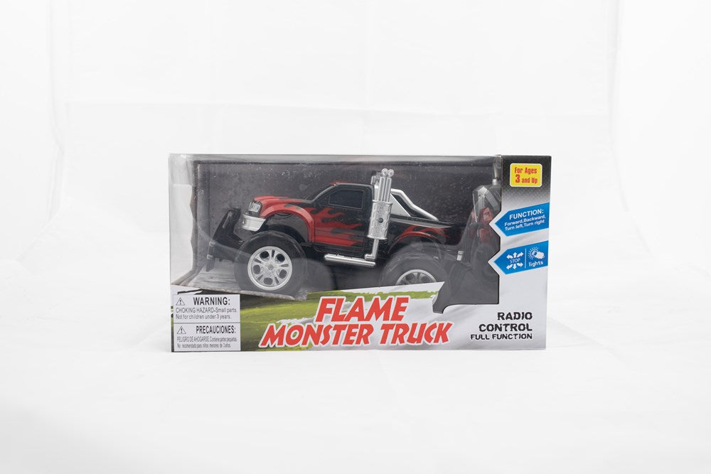 Red and black RC monster pickup truck with large off-road tires in clear display box.