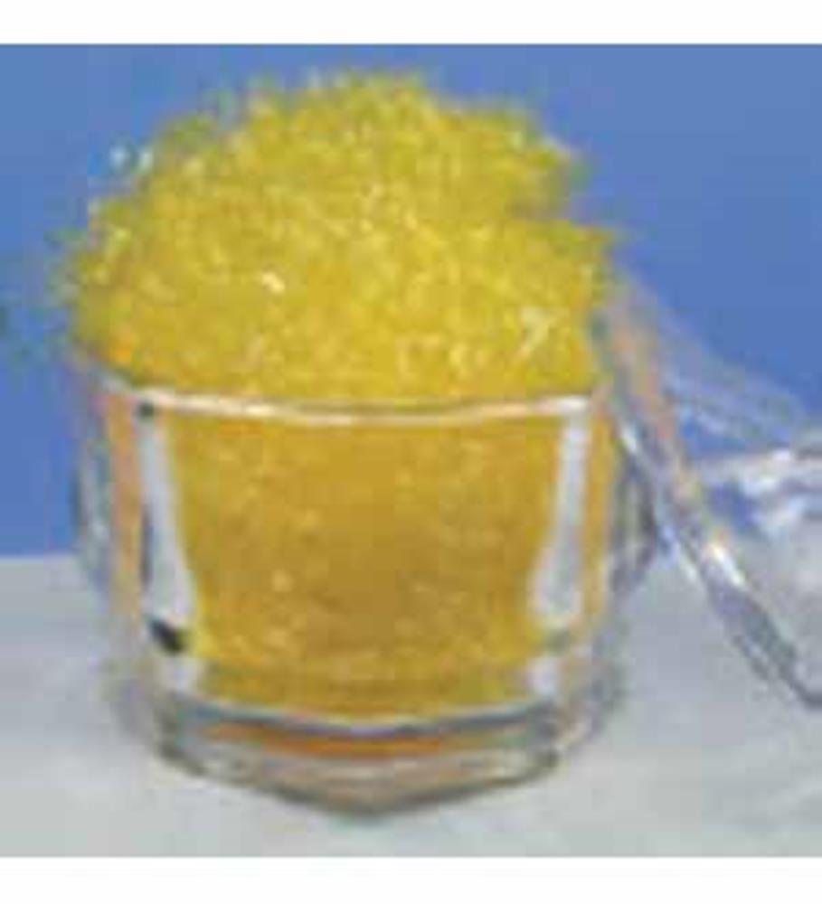 Clear round container filled with bright yellow decorative shredded grass with a clear lid beside it.