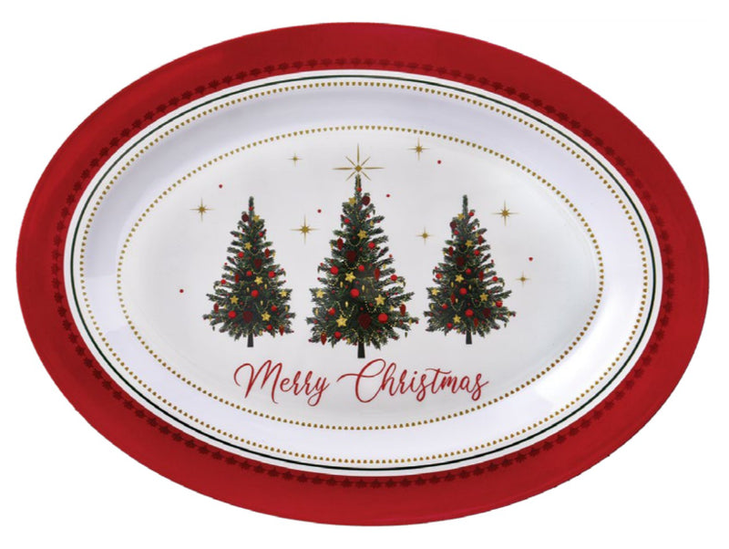 Oval ceramic serving platter with red rim, three decorated Christmas trees, and "Merry Christmas" text.