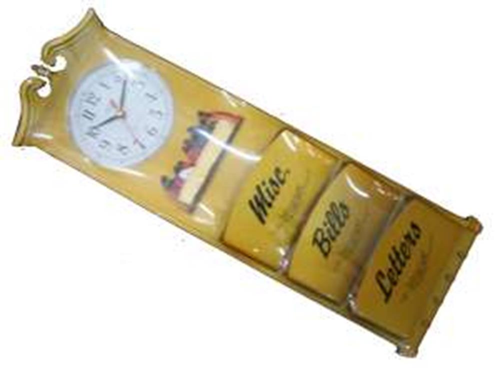 Gold letter rack with three labeled compartments and a white clock at the top, ornate crown detail.