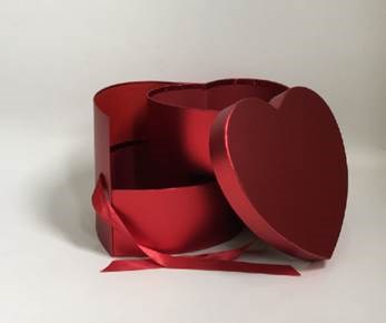 Red heart-shaped gift box with removable lid and matching satin ribbon handle.