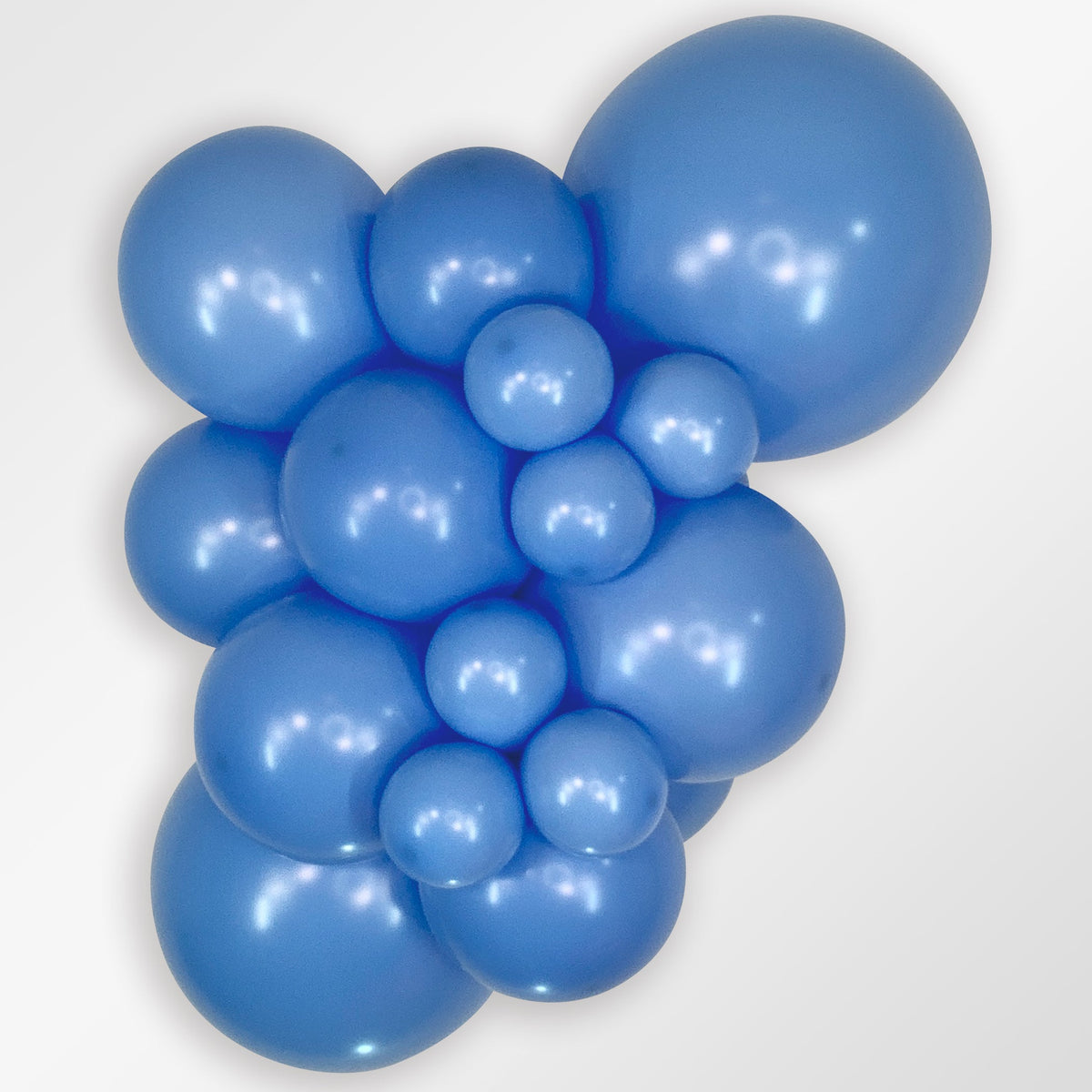 Sempertex Deluxe Periwinkle Blue latex balloon color cluster showing the shade across multiple balloon sizes