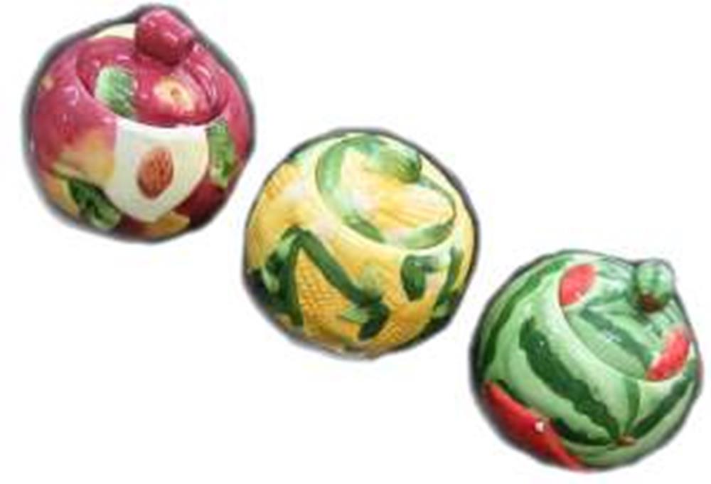 Set of three ceramic sugar jars shaped and painted like a red apple, yellow melon, and green watermelon.