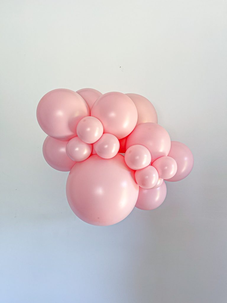 Tuftex Romey latex balloon color cluster showing the shade across multiple balloon sizes