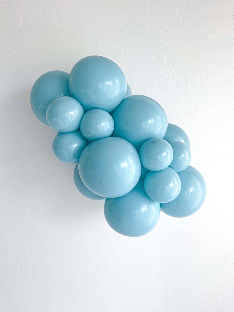 Tuftex Sea Glass latex balloon color cluster showing the shade across multiple balloon sizes
