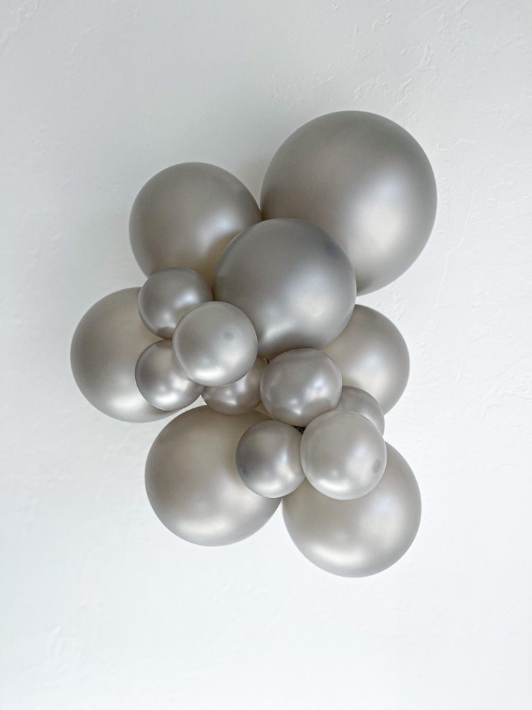 Tuftex Metallic Silver latex balloon color cluster showing the shade across multiple balloon sizes