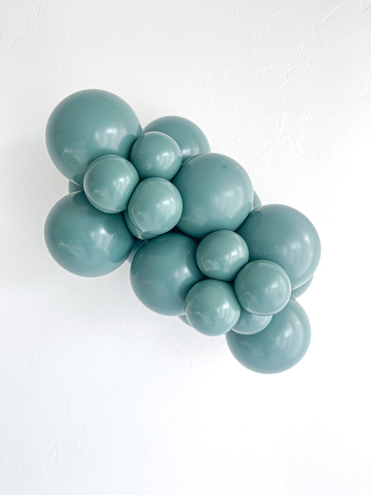 Tuftex Willow latex balloon color cluster showing the shade across multiple balloon sizes