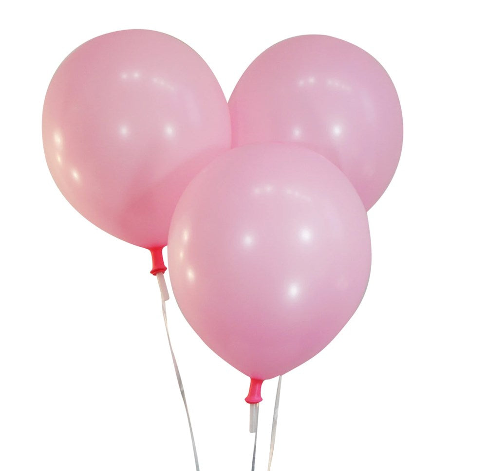 Three glossy hot pink latex balloons inflated and tied with white strings.