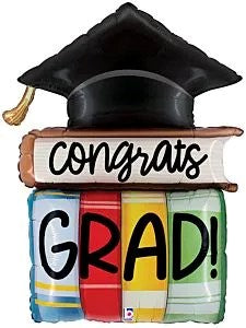 44-inch foil balloon shaped like a stack of colorful books with a black graduation cap and "Congrats Grad!" text.