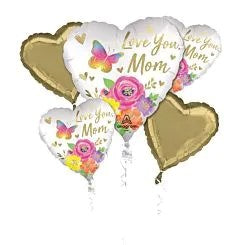 Heart-shaped foil balloons with floral designs and "Love You Mom" text, accented by gold heart balloons.