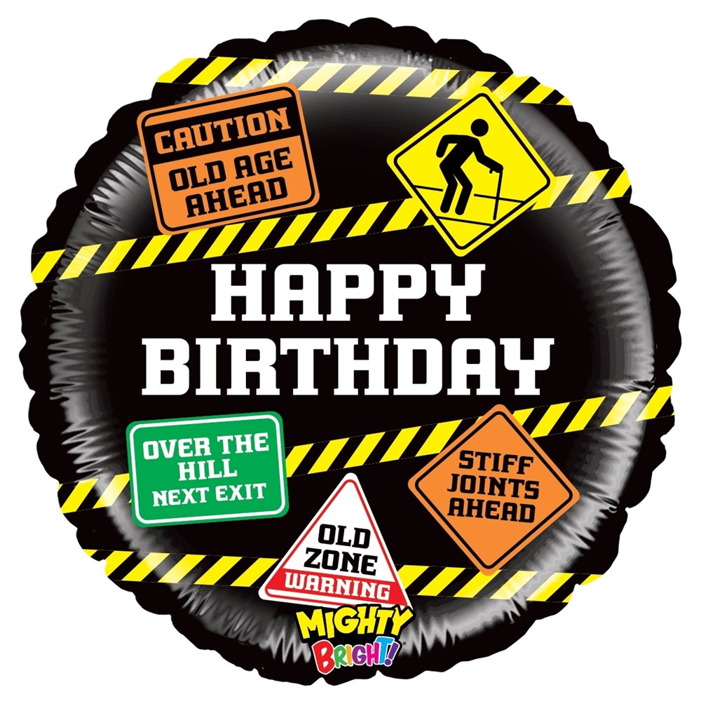 Round black foil balloon with yellow caution stripes and humorous old age warning signs around "Happy Birthday" text.