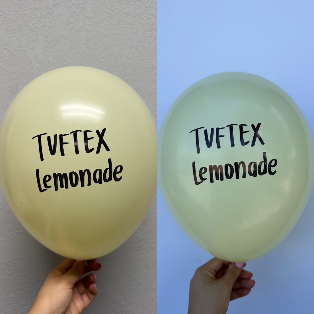 Pale yellow 17-inch latex balloon with black "Tuftex lemonade" text, round shape, glossy finish.