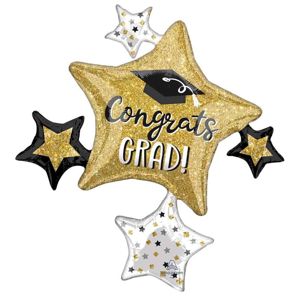 Gold star-shaped foil balloon with black graduation cap graphic and "Congrats Grad!" text, surrounded by smaller black and.