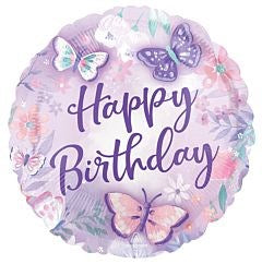 Round foil balloon in soft lavender with pastel butterflies and floral accents, featuring "Happy Birthday" in purple script.