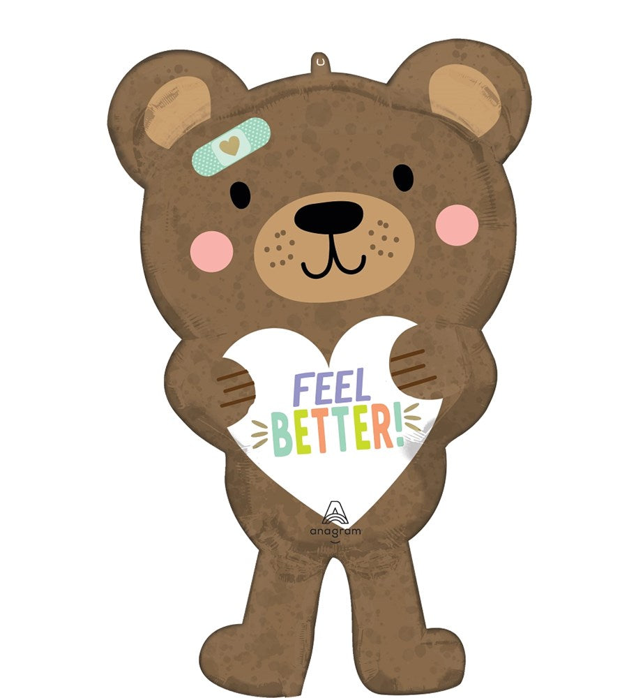 Brown bear foil balloon with pink cheeks and a bandaid holding a heart that says "Feel Better".