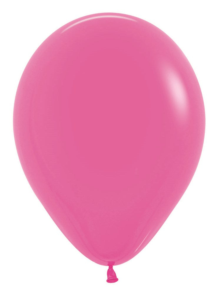 Bright fuchsia 5-inch round latex balloon with a glossy finish and tied neck.