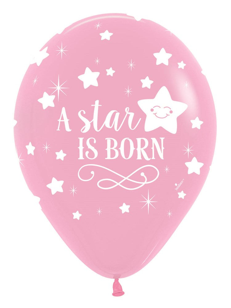 Pink latex balloon with white stars and smiling star graphic, text reads "A star is born".