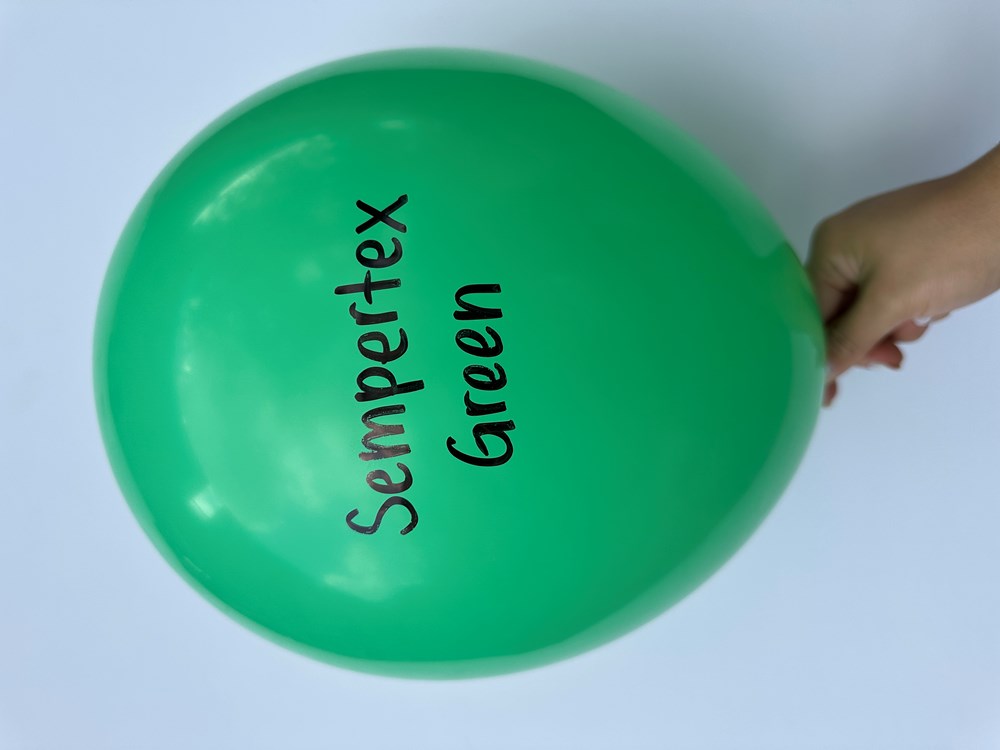 Bright green 18-inch latex balloon with "Sempertex Green" printed in black, held by hand.
