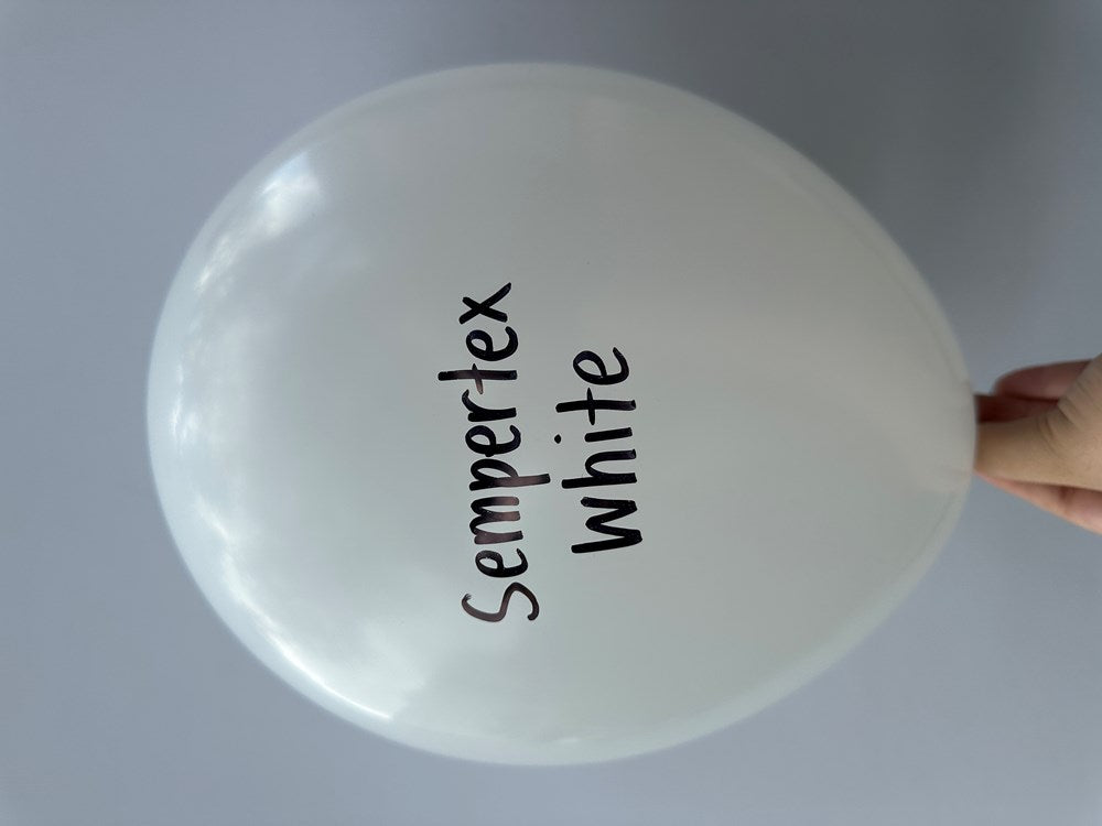 Large round white latex balloon with Sempertex White printed in black font on the surface.