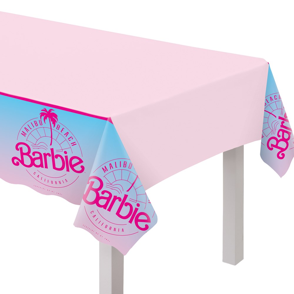 Rectangular pink plastic table cover with Barbie logos and scalloped edges in blue and pink.