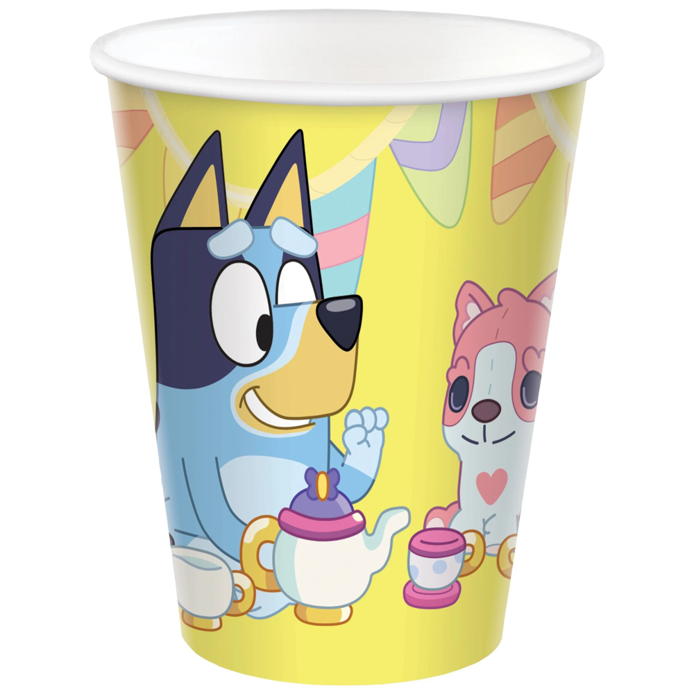 Yellow party cup featuring Bluey and Bingo characters holding tea set toys, 9-ounce size.