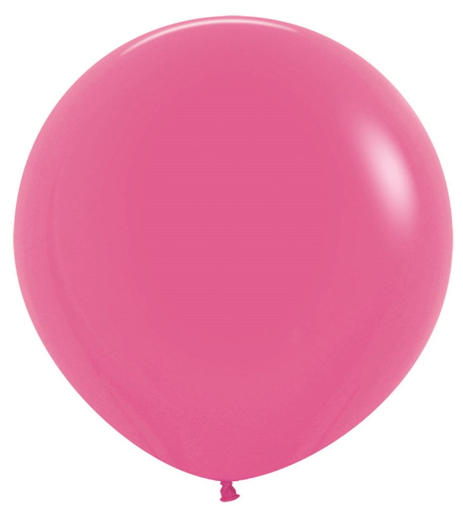 Bright fuchsia 24-inch round latex balloon with a smooth, glossy surface and tied end.