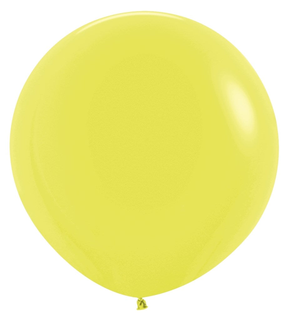 Large round neon yellow latex balloon inflated to full size with glossy surface and tied end.