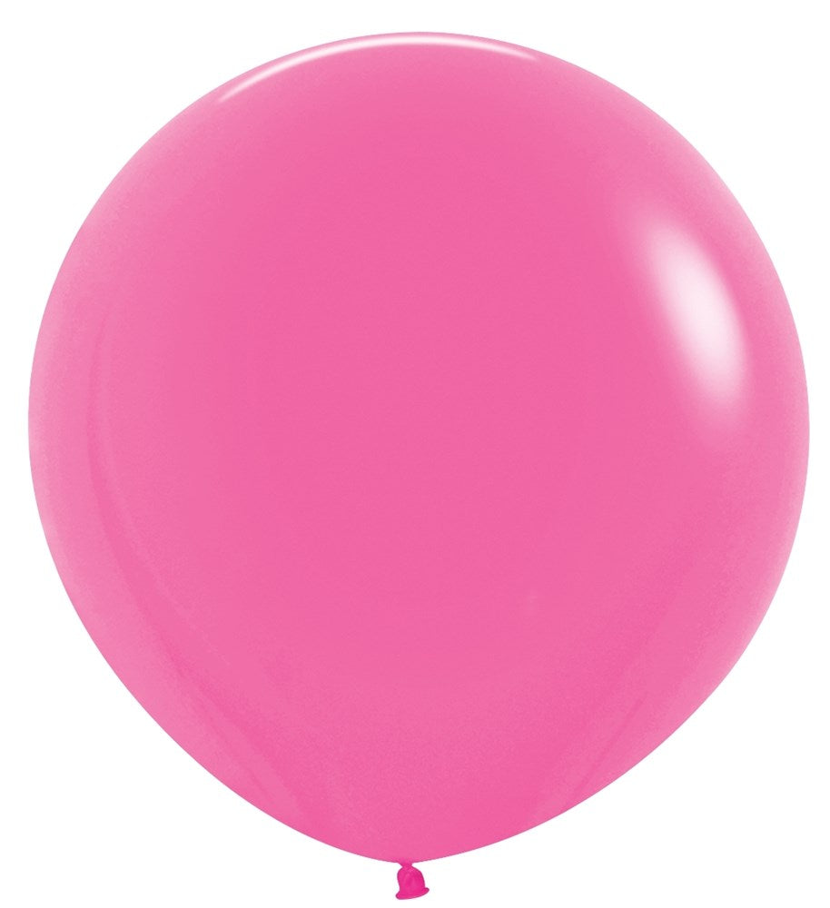 Round neon magenta latex balloon inflated to 24 inches with smooth surface and tied end.