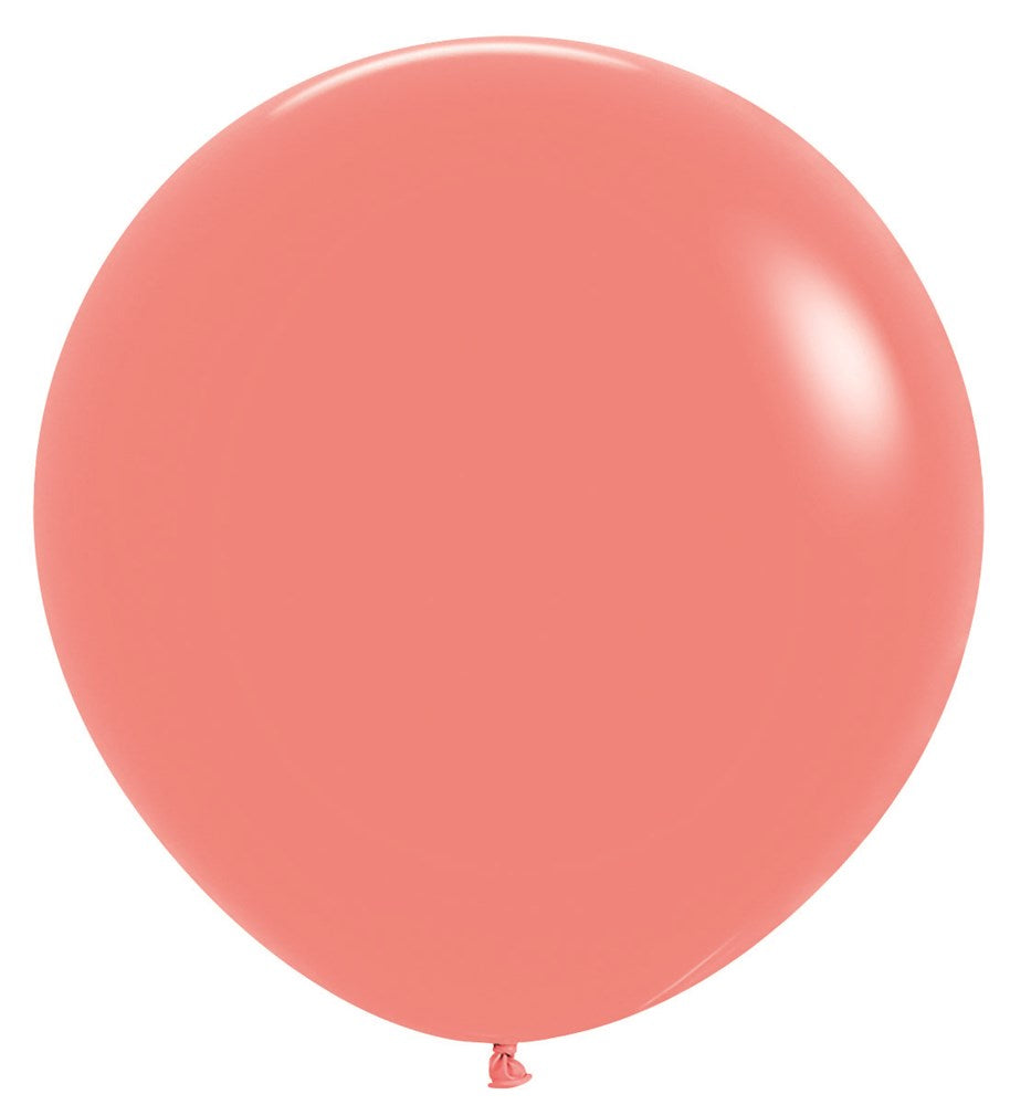Large round latex balloon in tropical coral color with a smooth, glossy finish.