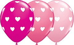 Three 11-inch latex heart balloons in dark pink, medium pink, and light pink with white heart patterns.