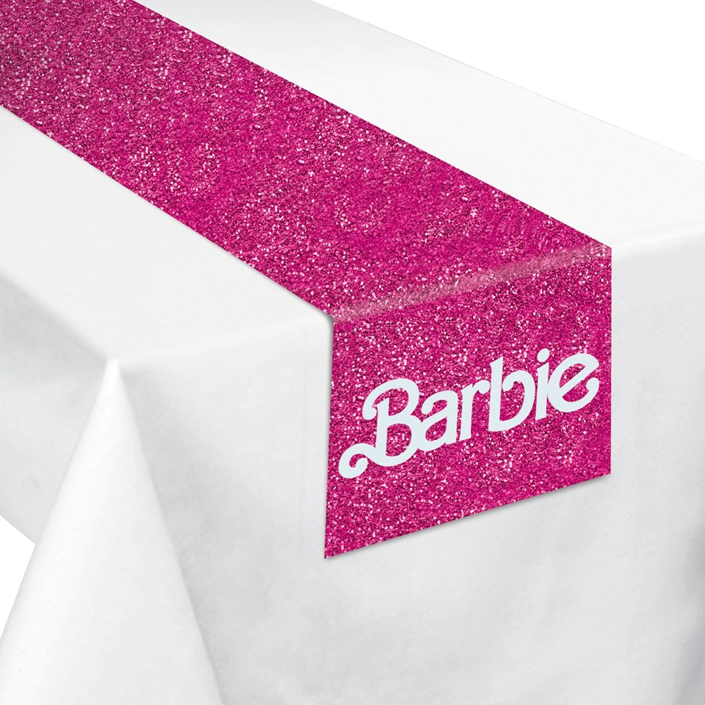 Bright pink glittery table runner with white Barbie logo on the end, rectangular shape.