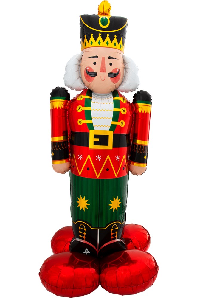 61-inch foil balloon shaped like a colorful Christmas nutcracker soldier with red, green, black, and gold details and a.