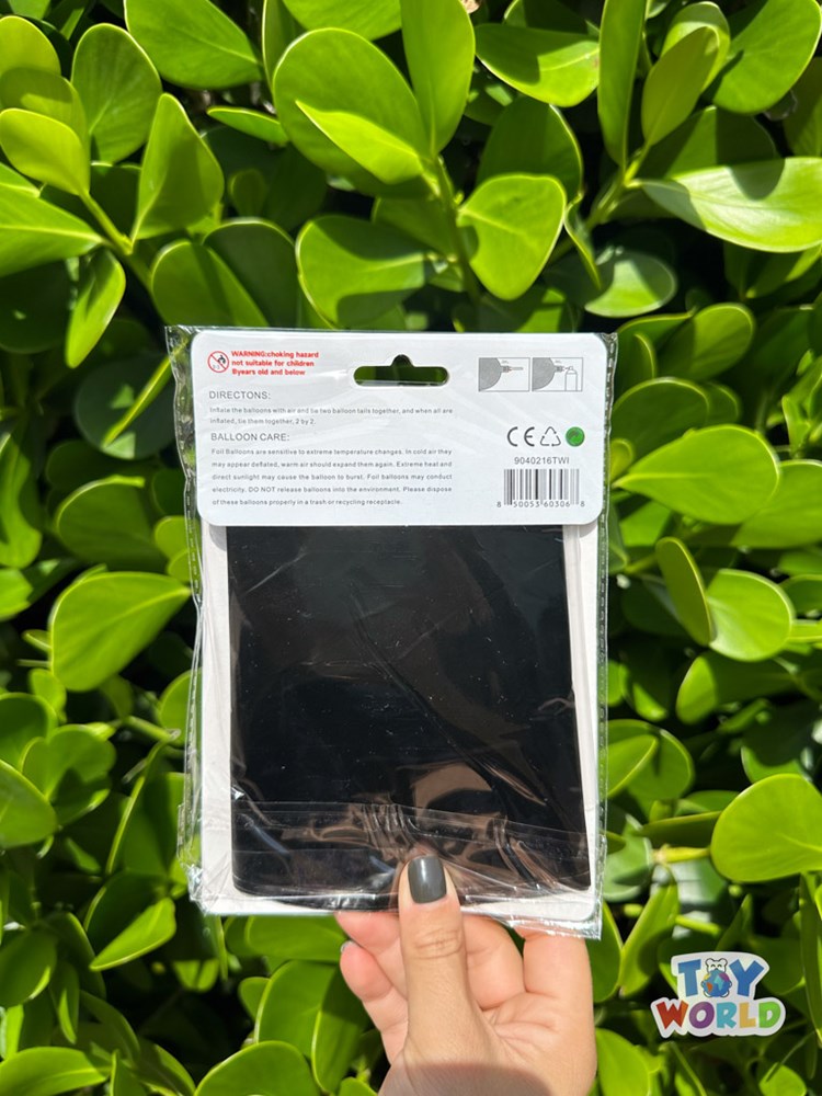 Packaged black foil balloon folded flat, 40-inch starburst shape, sealed in clear plastic bag.