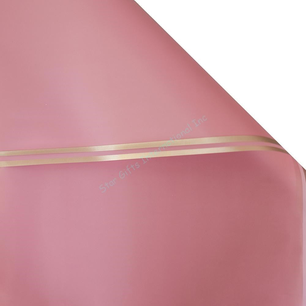 Light red wrapping paper with a smooth matte finish and a thin gold edge border.