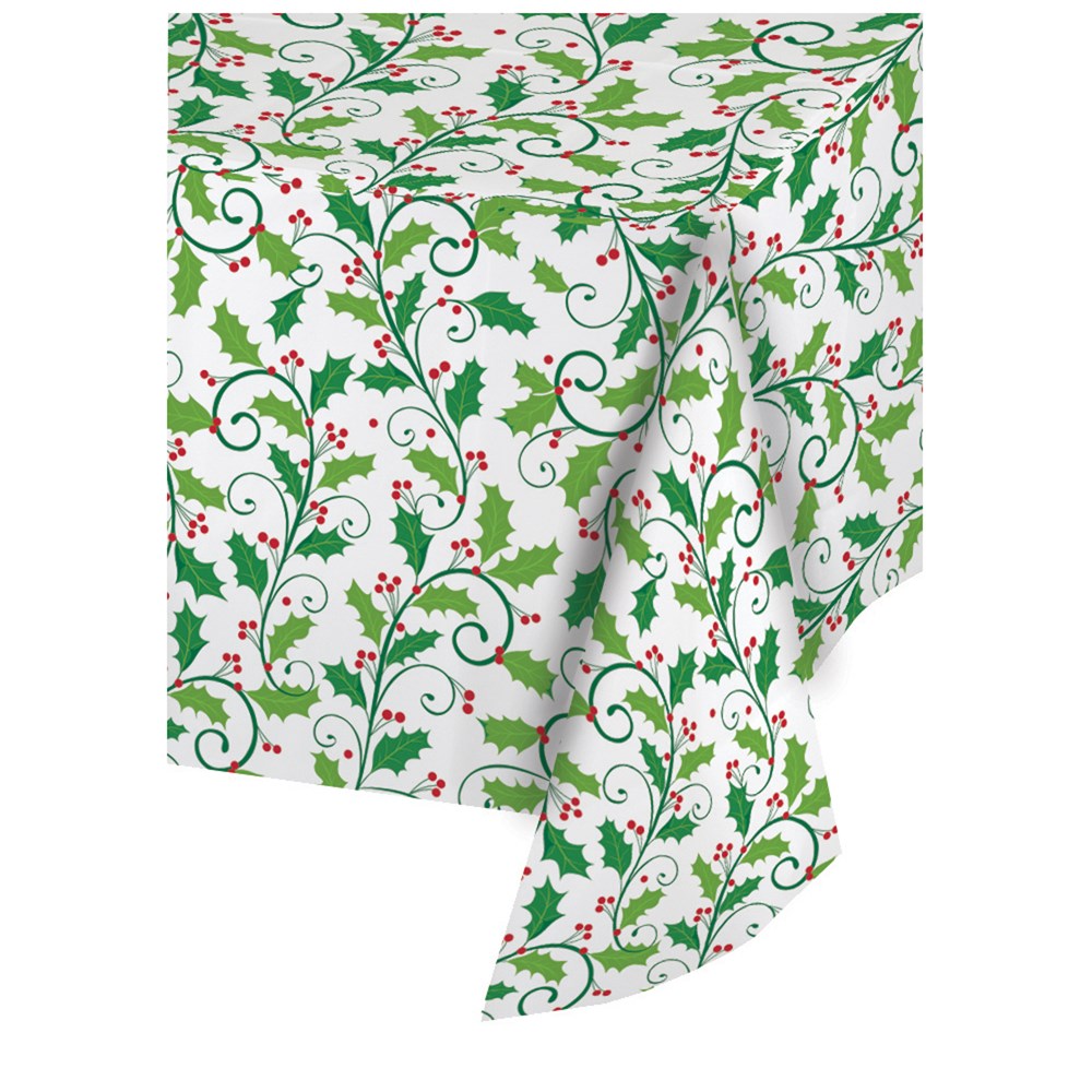 White plastic tablecover roll with green holly leaves and red berries pattern.