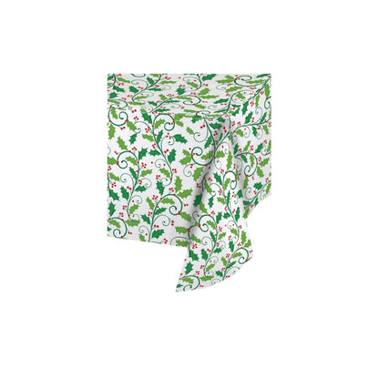 White plastic tablecover with green holly leaves and red berries pattern, festive Christmas design.