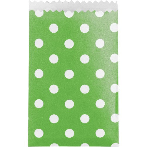 Small lime green paper treat bag with white polka dots and a scalloped top edge.